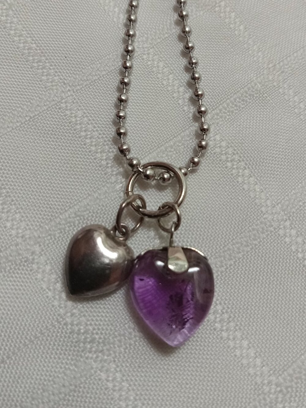 A minimalist handmade chain with 2 small Sterling silver 925 pendants